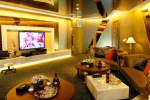 TV a/nebo společenská místnost v ubytování Central Hotel Shanghai - Nanjing Road