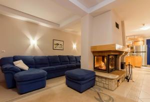 Ein Sitzbereich in der Unterkunft Apartments and Rooms kod Eli