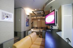تلفاز و/أو أجهزة ترفيهية في Hotel RR (Adult Only)