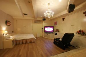 تلفاز و/أو أجهزة ترفيهية في Hotel RR (Adult Only)