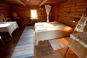 Postel nebo postele na pokoji v ubytování Metsara B & B