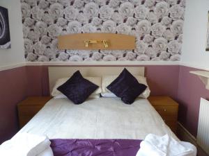 Кровать или кровати в номере The Avon