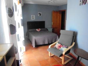 A bed or beds in a room at Casa del Sol