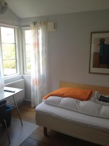 Letto o letti in una camera di Hotell Oskar