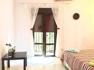 A bed or beds in a room at Estudio Las Huertas