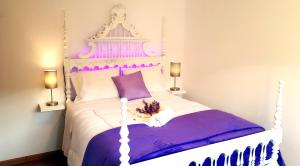 Cama ou camas em um quarto em Guesthouse of Alcobaça