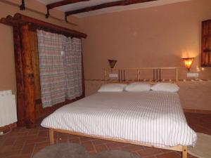 Postel nebo postele na pokoji v ubytování Apartamentos Jaronil
