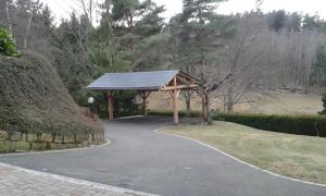 a gazebo in a park with a path at Romantic Studio Vacances in Labaroche