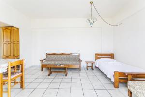 Postel nebo postele na pokoji v ubytování Yiannis Ηotel
