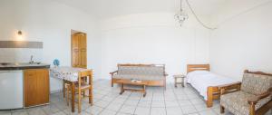 Kuchyň nebo kuchyňský kout v ubytování Yiannis Ηotel