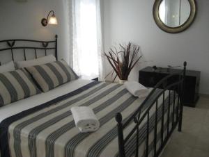 Postel nebo postele na pokoji v ubytování Apartments Villa Diha