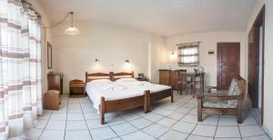 Postel nebo postele na pokoji v ubytování Yiannis Ηotel