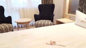 Letto o letti in una camera di Hotel Graf Bentinck