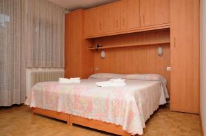 Postel nebo postele na pokoji v ubytování Hotel Cima Tosa