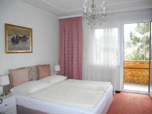 Postel nebo postele na pokoji v ubytování Hotel Rosner