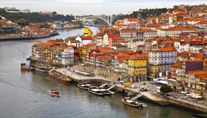 a view of a city with boats in the water at M&M Space Apartments MM1 in Porto