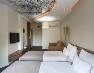 Ліжко або ліжка в номері Hotel Sole
