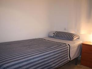 Posteľ alebo postele v izbe v ubytovaní Apartamento moderno cerca del centro
