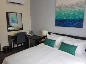 Letto o letti in una camera di The View Hotel