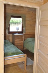 Postel nebo postele na pokoji v ubytování Northwick Farm Lodges
