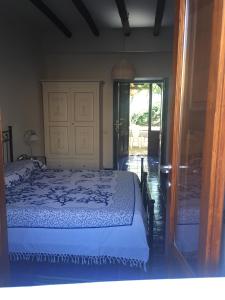 Posteľ alebo postele v izbe v ubytovaní Casa Martha
