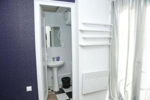 Koupelna v ubytování Hotel Elma