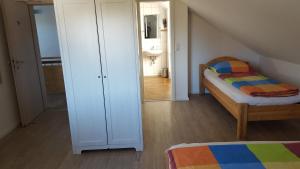 Cama o camas de una habitación en Dreimäderlhaus Rieden