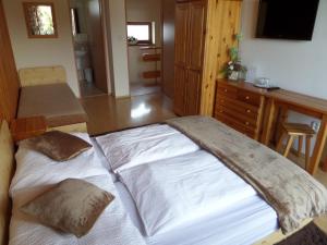 A bed or beds in a room at Privat Jasmin