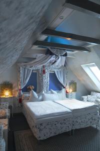 Postel nebo postele na pokoji v ubytování Hotel Don Giovanni