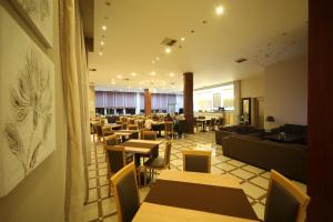Posedenie v ubytovaní Athina Airport Hotel