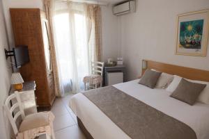 Postel nebo postele na pokoji v ubytování Motel Cap Sol