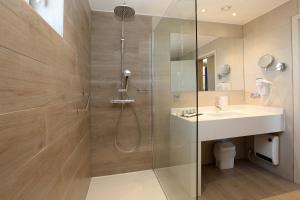 Koupelna v ubytování Hotel Donny