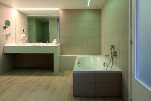 Een badkamer bij Hotel Donny