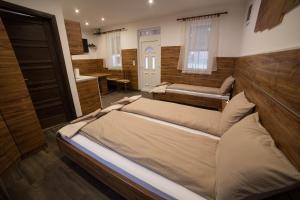 Ένα ή περισσότερα κρεβάτια σε δωμάτιο στο Relax Apartmanház