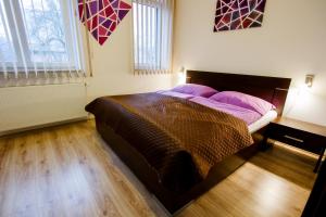 A bed or beds in a room at Sentami