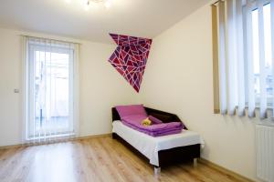A bed or beds in a room at Sentami