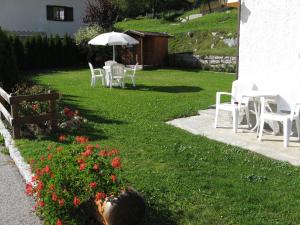 Κήπος έξω από το Albergo Garnì Maso Mistrin