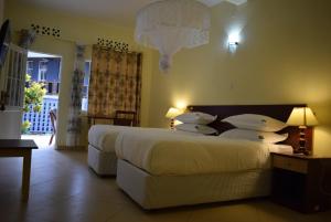 Cama o camas de una habitación en Kivu Peace View Hotel