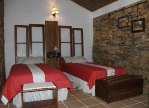 Säng eller sängar i ett rum på Couto dos Pardinhos