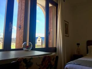 Ένα ή περισσότερα κρεβάτια σε δωμάτιο στο Albergo Isetta