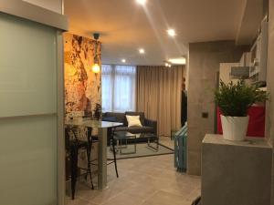 Posedenie v ubytovaní Piso con piscina y garaje en la Playa de Las Canteras