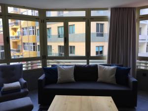 Posedenie v ubytovaní Piso con piscina y garaje en la Playa de Las Canteras