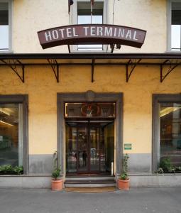 a hotel terminal with a sign above the door at Hotel Terminal in Milan