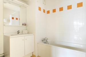 Et badeværelse på Neoresid - Résidence Le Valencey