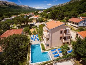 an aerial view of a villa with a swimming pool at Apartmani Ana Juranić in Jurandvor