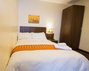 Voodi või voodid majutusasutuse Sinclair Guest House toas