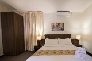 Voodi või voodid majutusasutuse Sinclair Guest House toas