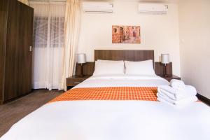 Voodi või voodid majutusasutuse Sinclair Guest House toas