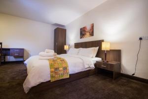 Voodi või voodid majutusasutuse Sinclair Guest House toas