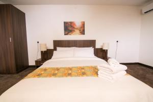 Voodi või voodid majutusasutuse Sinclair Guest House toas